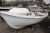 Used dinghy, with steering console. 4.09 meters