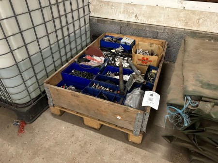 Pallet with various bolts, screws, etc.