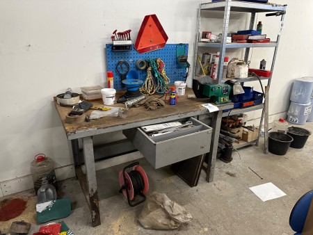 File bench with contents of various tools, bench grinder, etc.