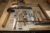 Workbench on wheels, approx. 2500 x 1250 mm. Contents of various tools and supplies (paints, sealants, etc.) + workbench on wheels, approx. 2000 x 1000 mm