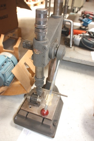 Hand operated stamping machine