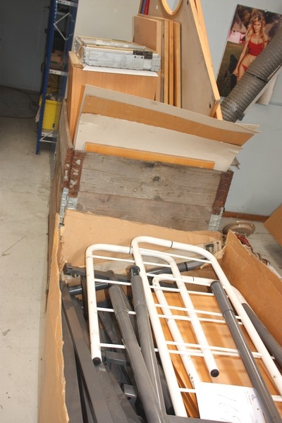 2 pallets Furniture and shelving parts, including corner desk