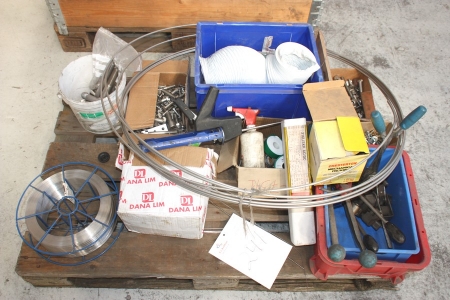 Pallet with miscellaneous including strapping, welding electrodes, bolts, welding wire