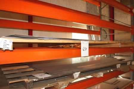 Metal panels on a pallet with a shelf in pallet racking