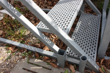 Galvanized stair landing. New. 8 steps. Landing height approx. 1580 mm. Can be fitted with transport wheels (which may be purchased separately from the seller)