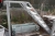 Galvaniseret trappe med repos. Ny. 8 trin, højde til repos ca. 1580 mm. Kan monteres med transporthjul (som kan købes separat af sælger)