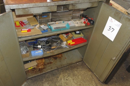 Steel cabinet with drills + various cutting tools, etc.