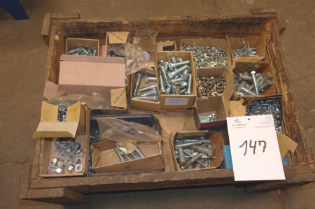 Pallet with various bolts and nuts