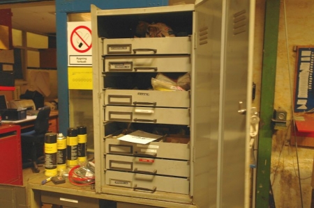 Steel cabinet containing various welding parts etc.