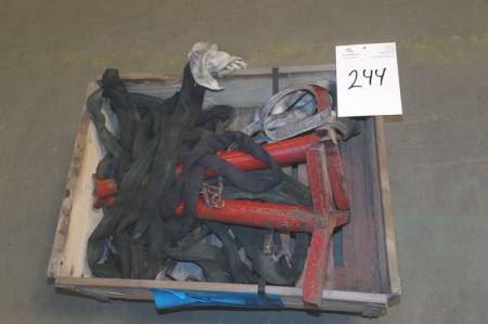 Pallet with various lifting straps, etc.