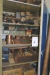 Content of the cabinet: various copper brass etc.
