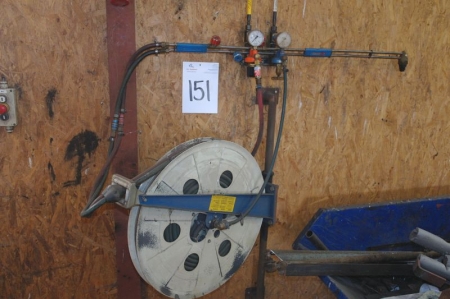 Torch set with hose reel on wall