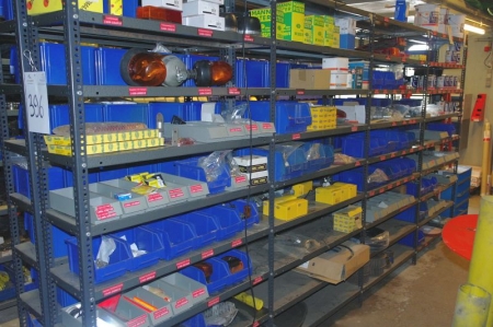 8 span steel rack containing various beacon + horn + oil filters + paint + screws + bolts + valves etc.