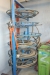 Air operated fitting press, Parks, with various tools + table with various consumables + reel cart with hose.