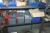 3 span steel rack containing various consumables + oil + painting etc.