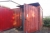 Container with built-in drum deburrer