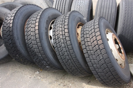 4 truck tires on rims, different brands, 305/70 R22.5 + 2. tire 315/70 R22.5. Used