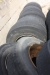 Approximately 16 truck tires on rims, 385/65 R22.5. Used