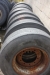 Approximately 16 truck tires on rims, 385/65 R22.5. Used