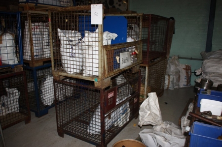 4 high cages containing plastic components for seeders
