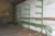 Div. paller med trækstænger + stativer for truck + grenreol monteret på væg