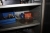 Steel Tool Cabinet including content including air angle grinder, electric drill + Eichler heat gun + aku-drill, Makita, with charger + 3 batteries, 9.6 V