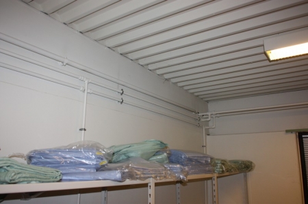 Many cloths on the top shelf in 4 subjects Steel Shelving