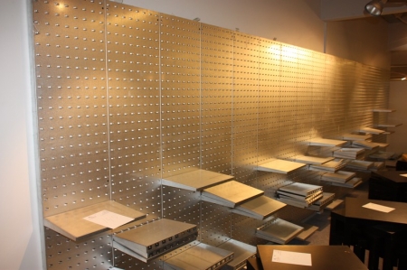 Display wall with metal shelves, galvanized. Length approx. 7 meters