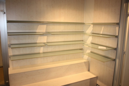 Wall display with glass shelves and aluminum rails (glued), a total of 7 sections