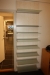Wall display with glass shelves and aluminum rails (glued), a total of 7 sections