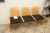 Wooden bench, Plaza. 3 seats. Black leather seat. Fröscher GmbH + painting + magazine rack, Lourens Fischer