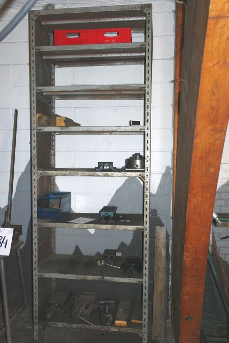 Steel Shelving containing various machine vices, etc.
