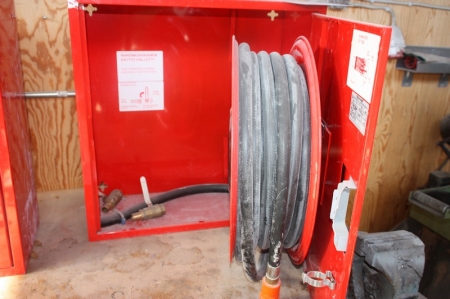 Fire cabinet with hose