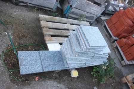 Pallet with granite tiles and granite butts