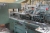 Muller Martini saddle stitcher. Type: 300 Volume 1989, consisting of five feeders with the option to attach one more. 2 adhesive apparatus + 1 stapler + one 3-cutter. Insertion machine with 2 feeders. Addressing device + foiling machine + shrink furnace +