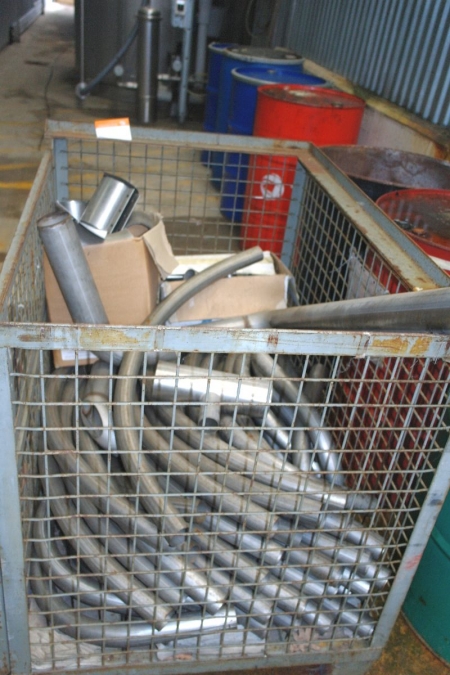 Grid Pallet containing various stainless steel pipes and bends