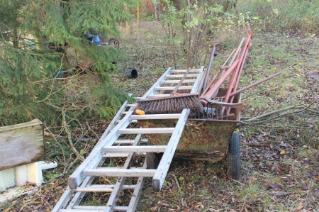 Wheelbarrow with tools and 3 aluminum ladders