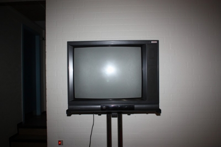 TV on roll stand + 2 images + mirror + Info cabinet
