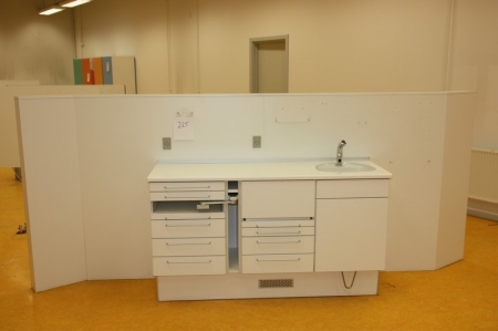 Double-sided hairdressing work station with sink on each side and drawers