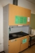 Environment cabinet with extractor, gas, water fixture, outlet + 2 tables with miscellaneous (everything must be collected)