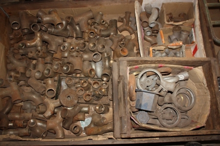 Pallet with various pipe fittings