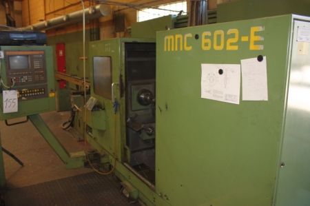 CNC horizontal lathe, 12 tools. Monfort S MNC 602-E. Rod Loader. Siemens Sinumerik control with built-on wireless receiver, Moxa. Including accessories