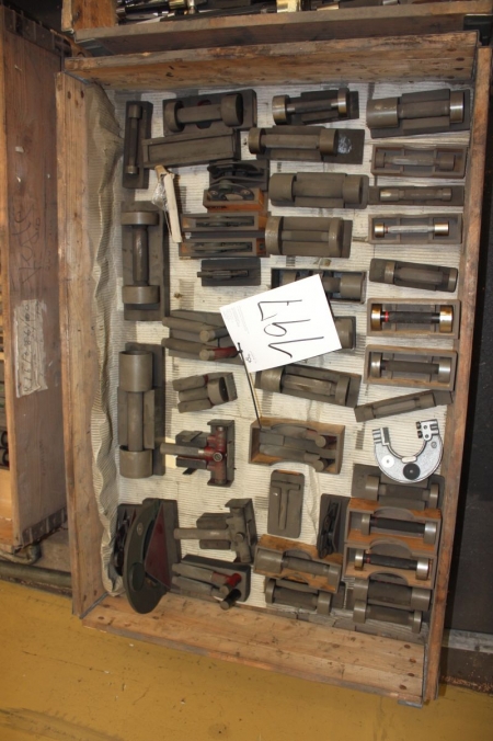 Pallet with various measuring tools
