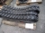 Pallet with 2 tracks for skid steer loader, outer circumference approx 320 cm, width is approximately 23 cm