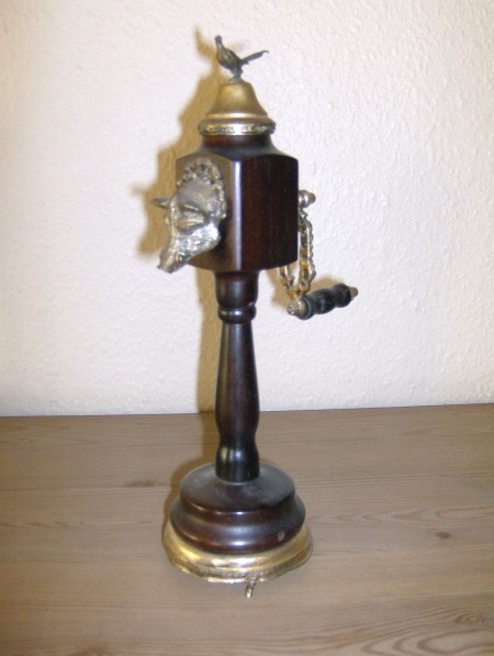 Peppercorn with music box unadorned "wild boar and pheasant", in brass