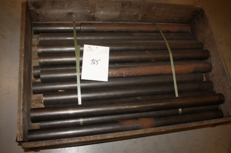 Pallet with poles labeled TG100. Pallet not included