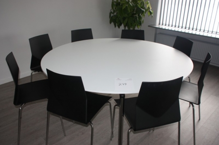 Round table, Randers & Radius, ø160 cm. Plate: white laminate. Chrome steel + 8 chairs, Four Design, Strand & Hvass + large green plant in pot, unable unknown