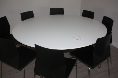 Round table, Randers & Radius, ø160 cm. Plate: white laminate. Chrome steel + 8 chairs, Four Design, Strand & Hvass + large green plant in pot, unable unknown