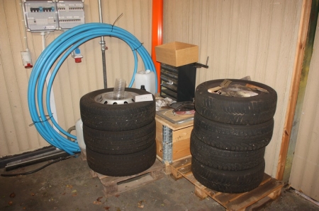 7 wheels, etc. in the corner (blue hose not included)