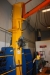 Pillar jib crane with electric hoist, Demag, 1000 kg. 1974. 2 speed up / down. Reach approx. 4 meters. Hook Height approx. 2.5 m + Magnetic lifting yoke, model PLM, 100 kg + air hose winding device